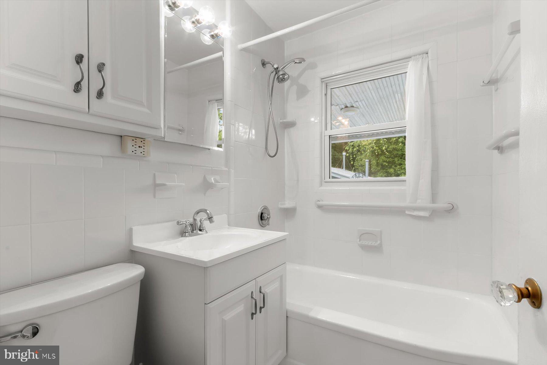3105 Fayette Road Kensington, MD 20895 - Photo 31 of 93 a bathroom with a sink a toilet and shower