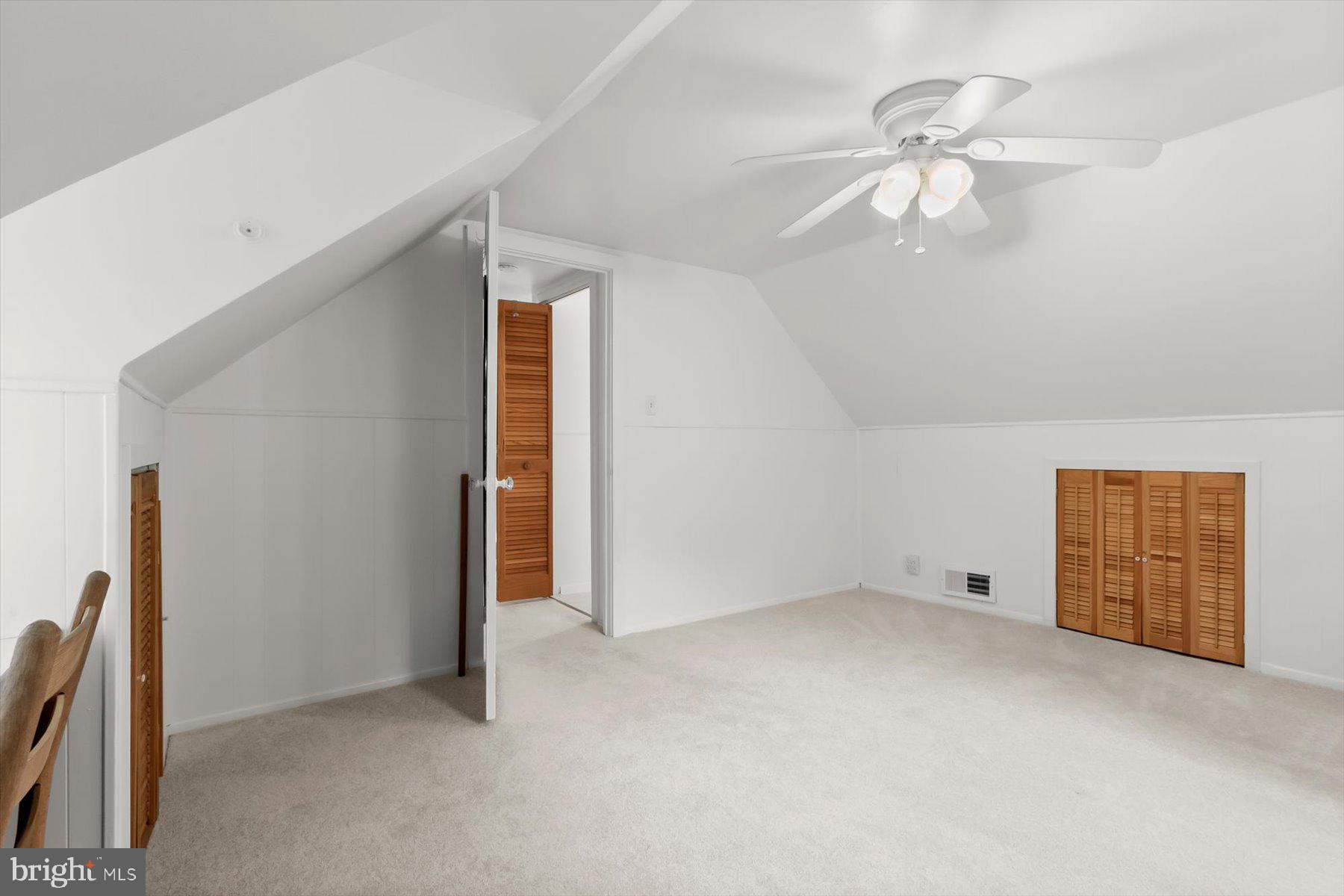 3105 Fayette Road Kensington, MD 20895 - Photo 50 of 93 an empty room with chandelier fan and windows