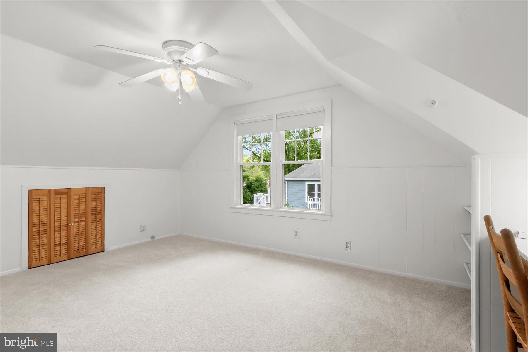 3105 Fayette Road Kensington, MD 20895 - Photo 54 of 93 an empty room with windows and chandelier fan