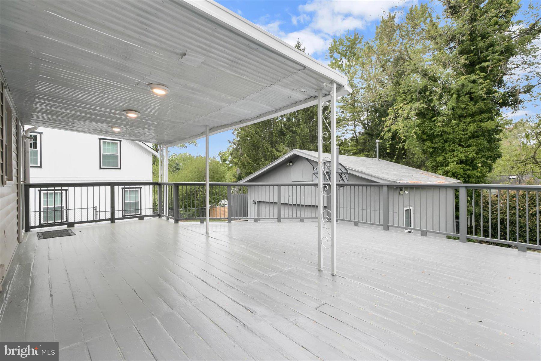 3105 Fayette Road Kensington, MD 20895 - Photo 69 of 93 a view of a house with a wooden deck