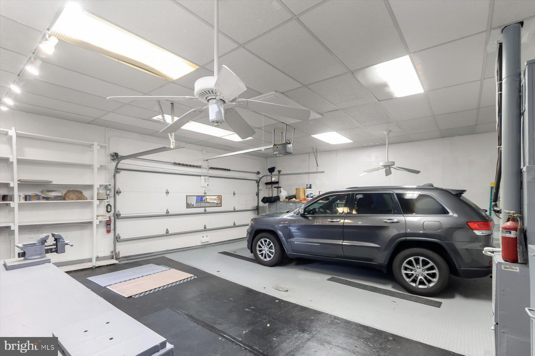 3105 Fayette Road Kensington, MD 20895 - Photo 82 of 93 Large garage with lots of lighting and ceiling fan