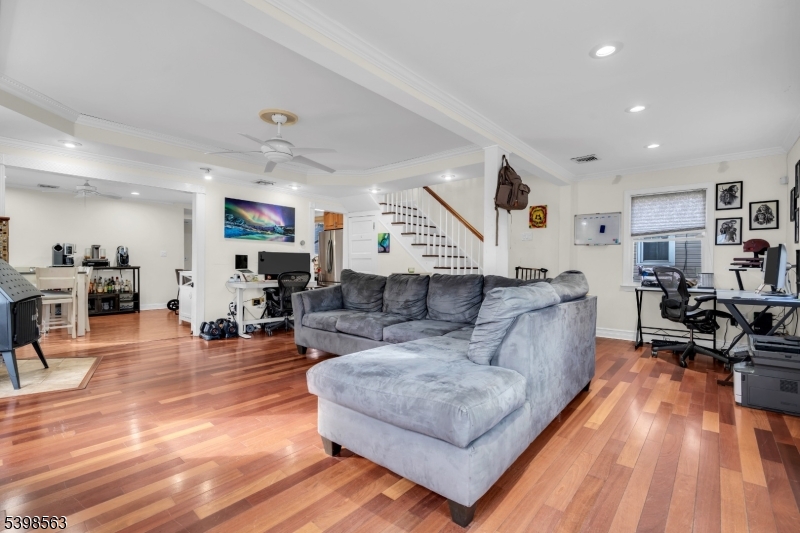18 Belle Terre Road West Orange, NJ 07052 - Photo 6 of 23 a living room with furniture and a wooden floor