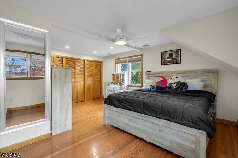 18 Belle Terre Road West Orange, NJ 07052 - Photo 10 of 23 a spacious bedroom with a bed and a dresser