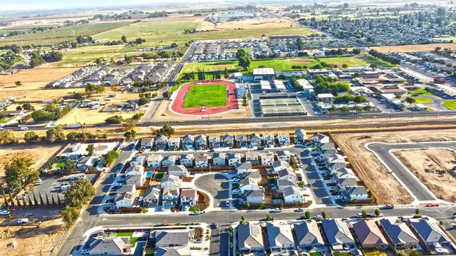 a picture of a room with a table and chairs