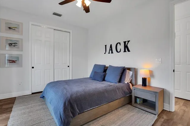 a living room with furniture or window and a bookshelf