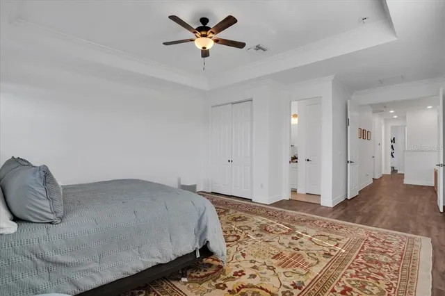 a view of a backyard with plants and a patio