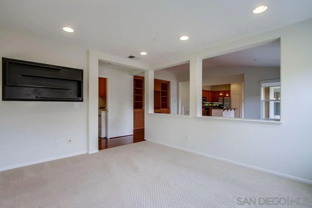 1631 Avery Road San Marcos, CA 92078 - Photo 19 of 32 an empty room with closet and windows