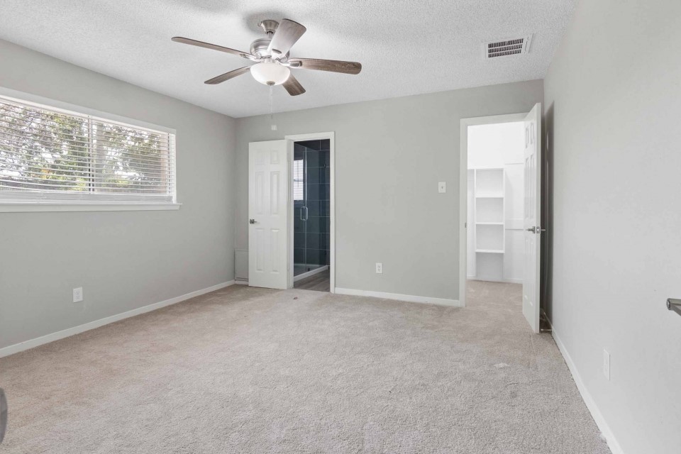 7403 Strawbridge Lane Houston, TX 77040 - Photo 12 of 22 a view of an empty room with a window