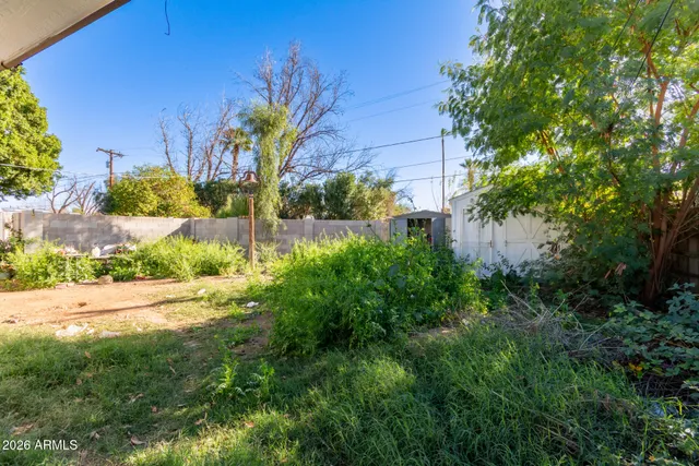 a view of a street with a building in front of it