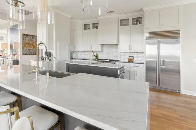 a view of entryway with a potted plant and a wooden floor