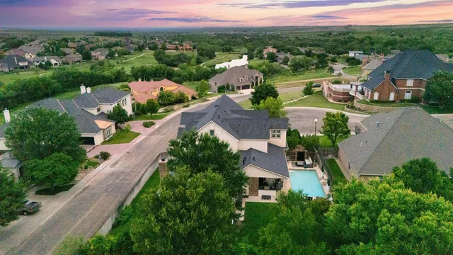 an aerial view of a house with a garden