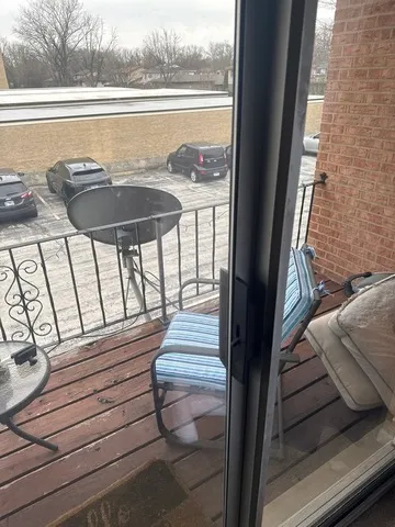a view of a balcony with lake view and a ocean view