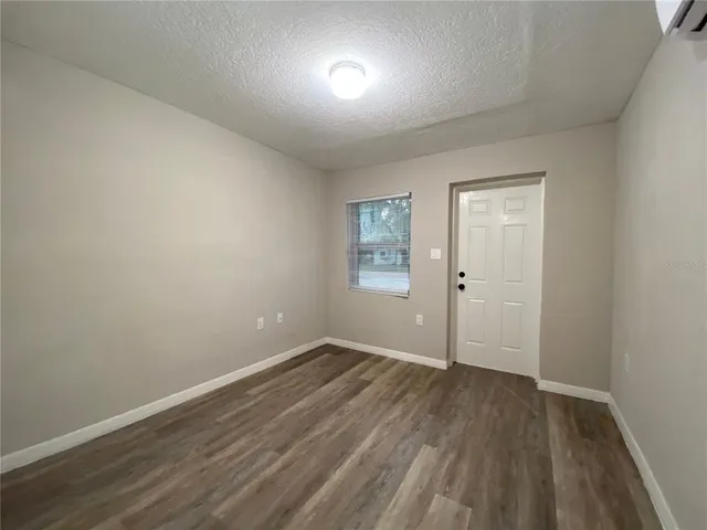 a kitchen with a stove top oven sink and cabinets