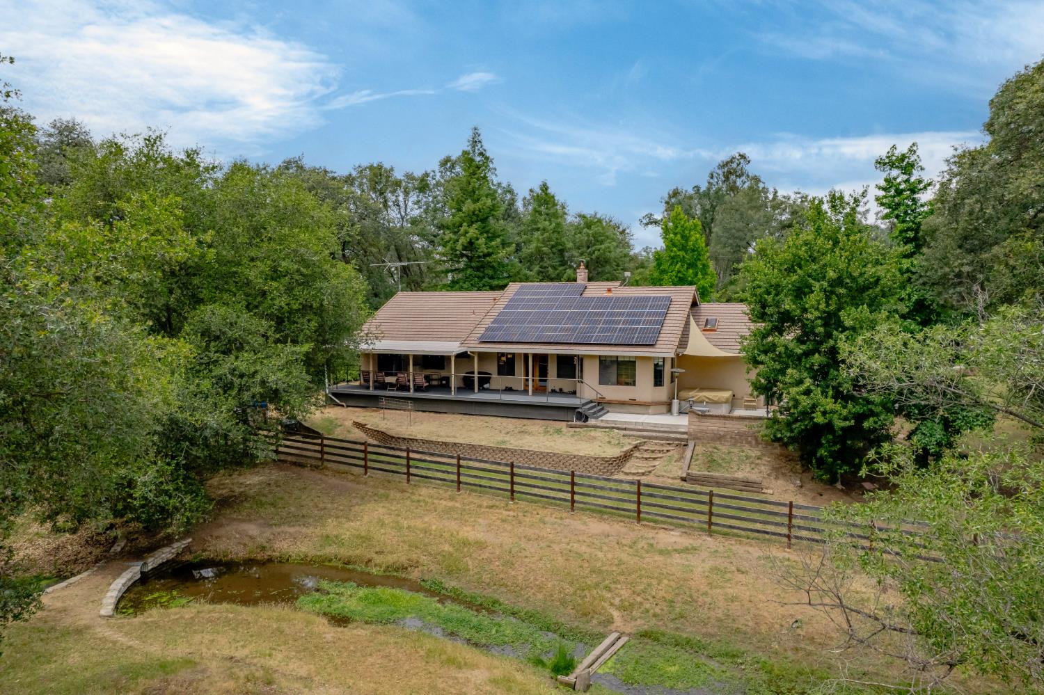 4920 Upson Downs Road Newcastle, CA 95658 - Photo 6 of 98 Back of home with trex deck and 14.72kw owned solar