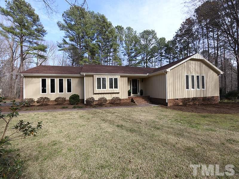 11908 Old Creedmoor Road Raleigh, NC 27613 - Photo 1 of 16 a view of a house with a yard