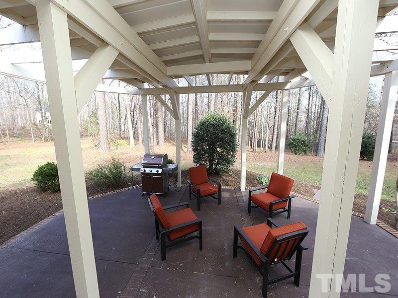 11908 Old Creedmoor Road Raleigh, NC 27613 - Photo 13 of 16 a outdoor space with patio