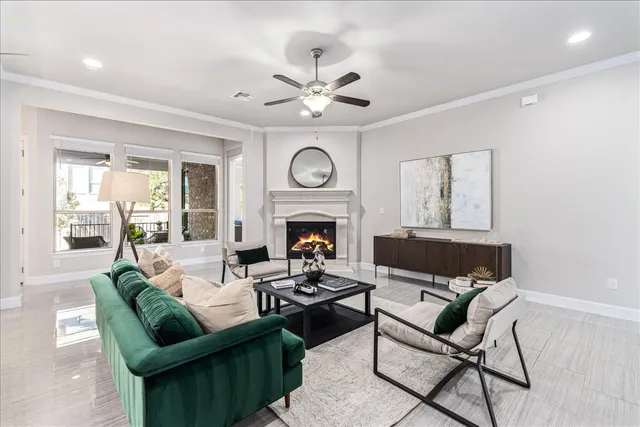 a dining room with furniture and window