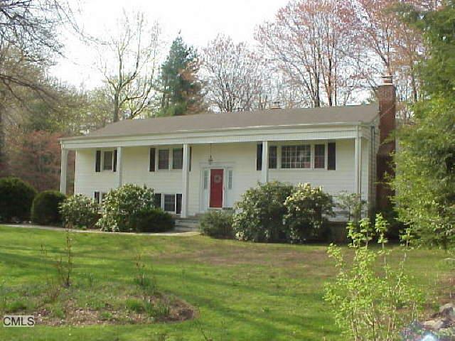 7 Canterbury Road Norwalk, CT 06851 - Photo 1 of 1 a front view of house with yard and green space