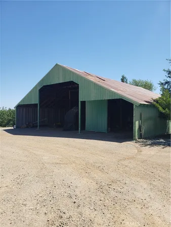 a house with trees in front of it