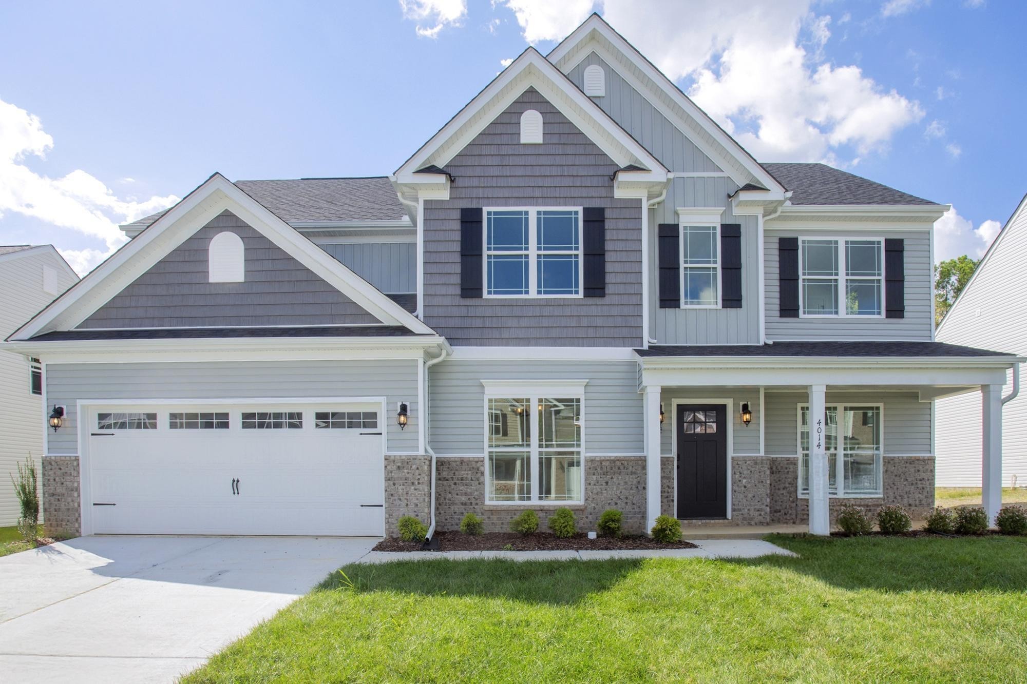 4014 Rampart Way Spring Hill Spring Hill, TN 37174 - Photo 2 of 48 front view of a house with a yard