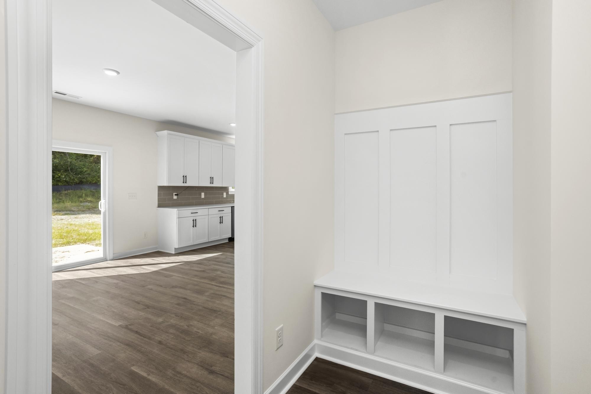 4014 Rampart Way Spring Hill Spring Hill, TN 37174 - Photo 21 of 48 a view of a kitchen with wooden floor and windows
