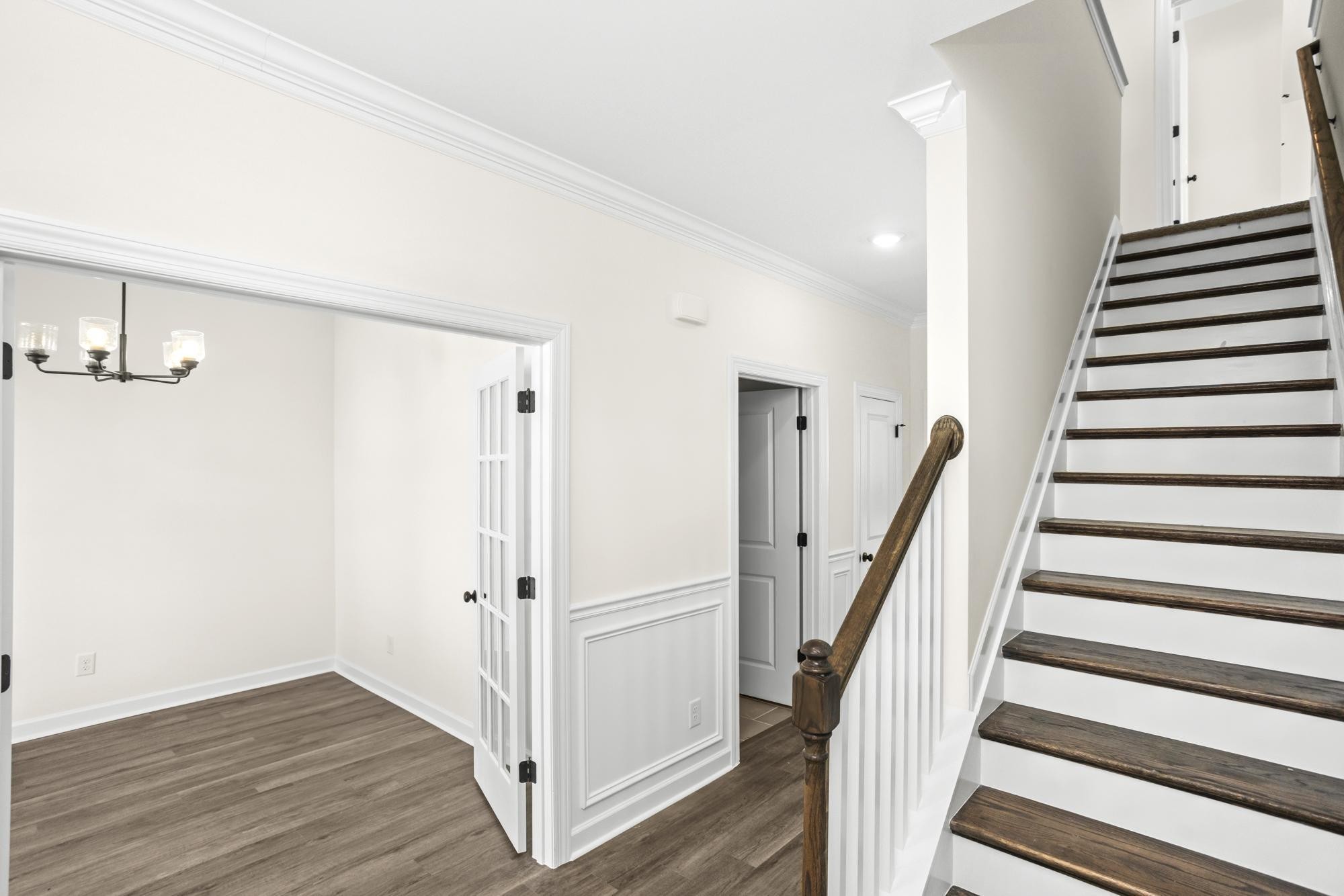 4014 Rampart Way Spring Hill Spring Hill, TN 37174 - Photo 24 of 48 a view of a hallway with wooden floor and staircase