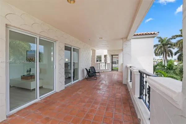 a picture of houses with outdoor space and lake view