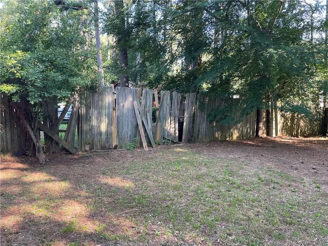 a view of backyard with green space