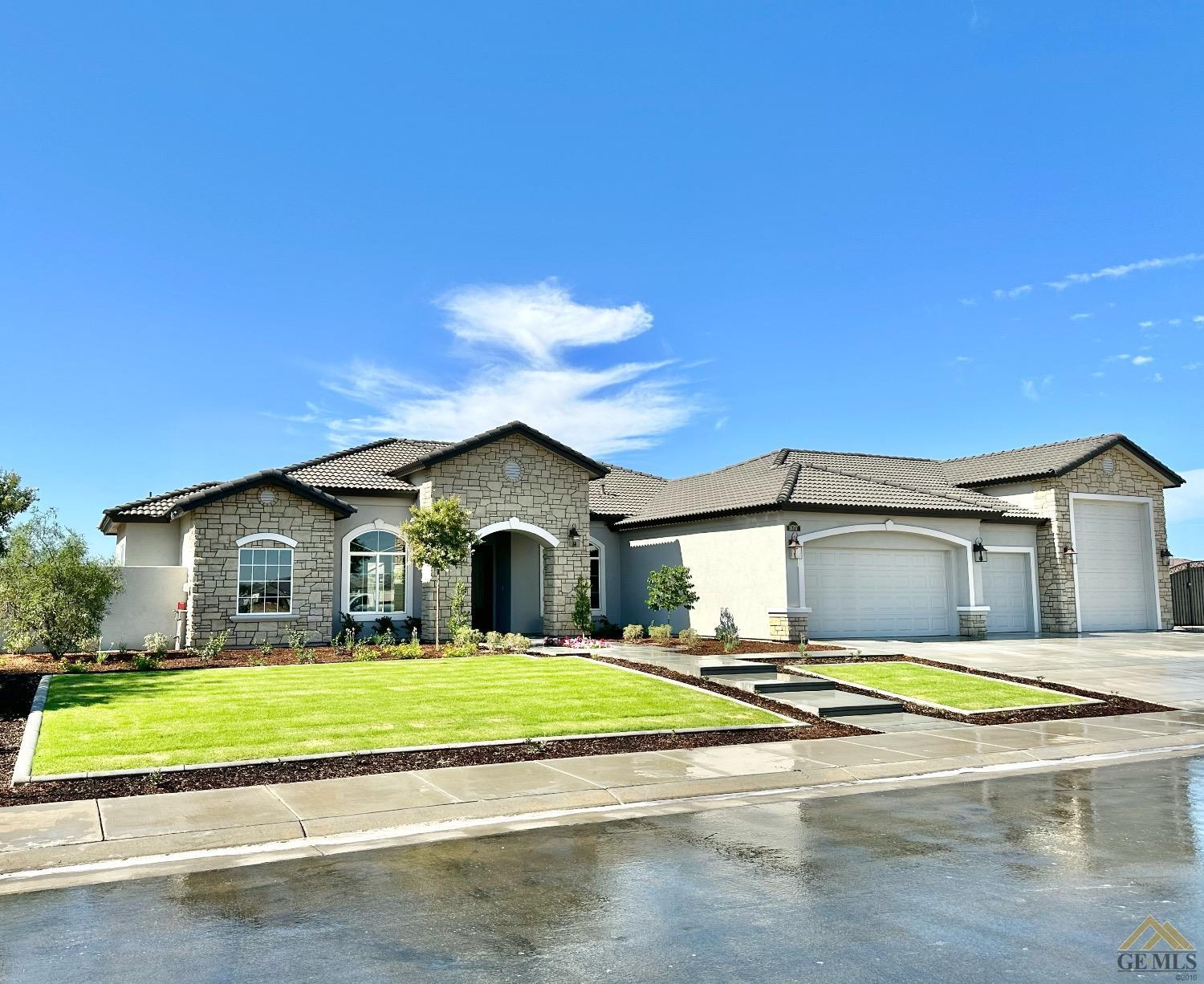 Undisclosed Address Bakersfield, CA 93314 - Photo 1 of 34 a view of a house with a big yard and large trees
