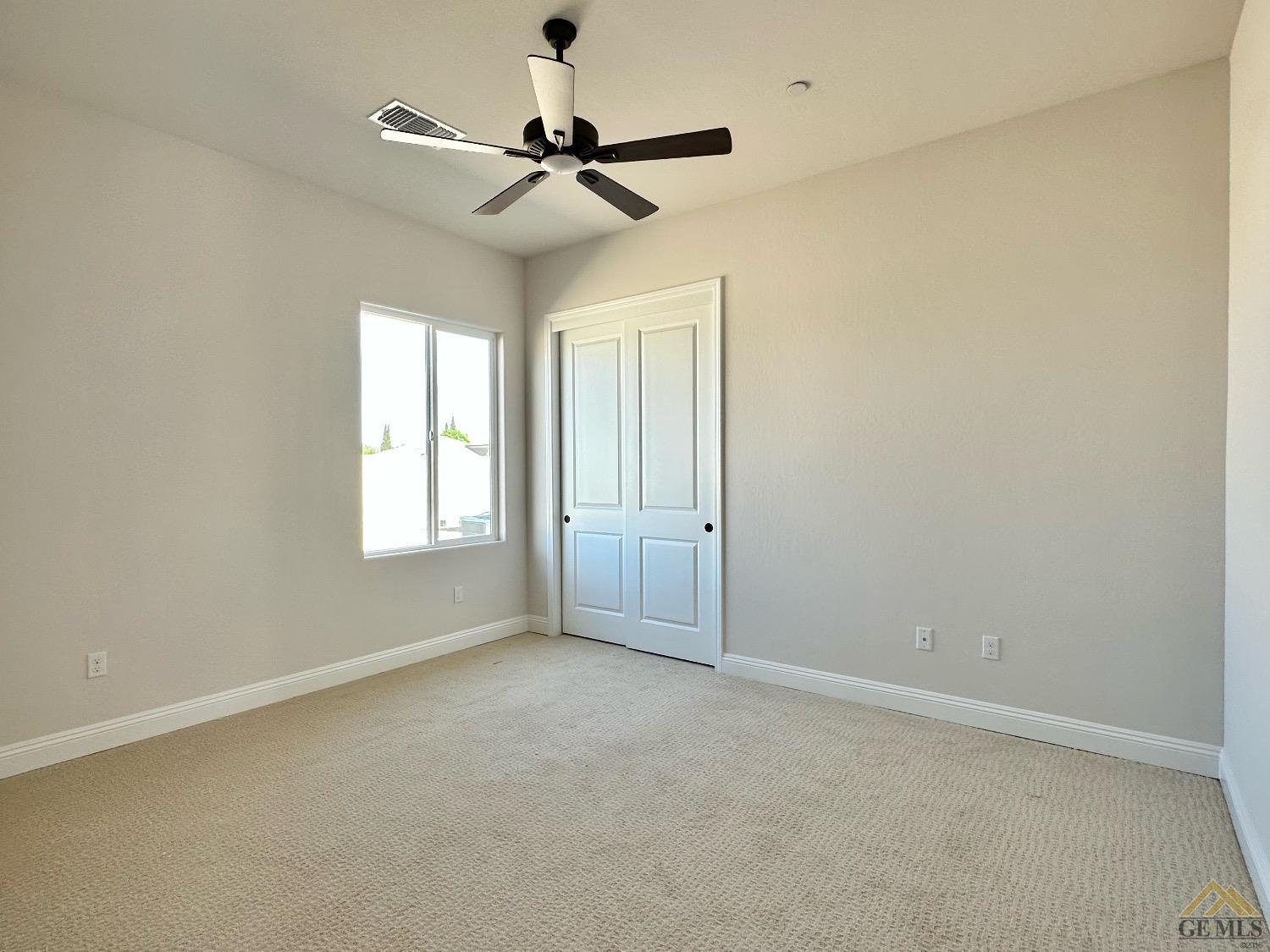 Undisclosed Address Bakersfield, CA 93314 - Photo 22 of 34 a view of an empty room with a window