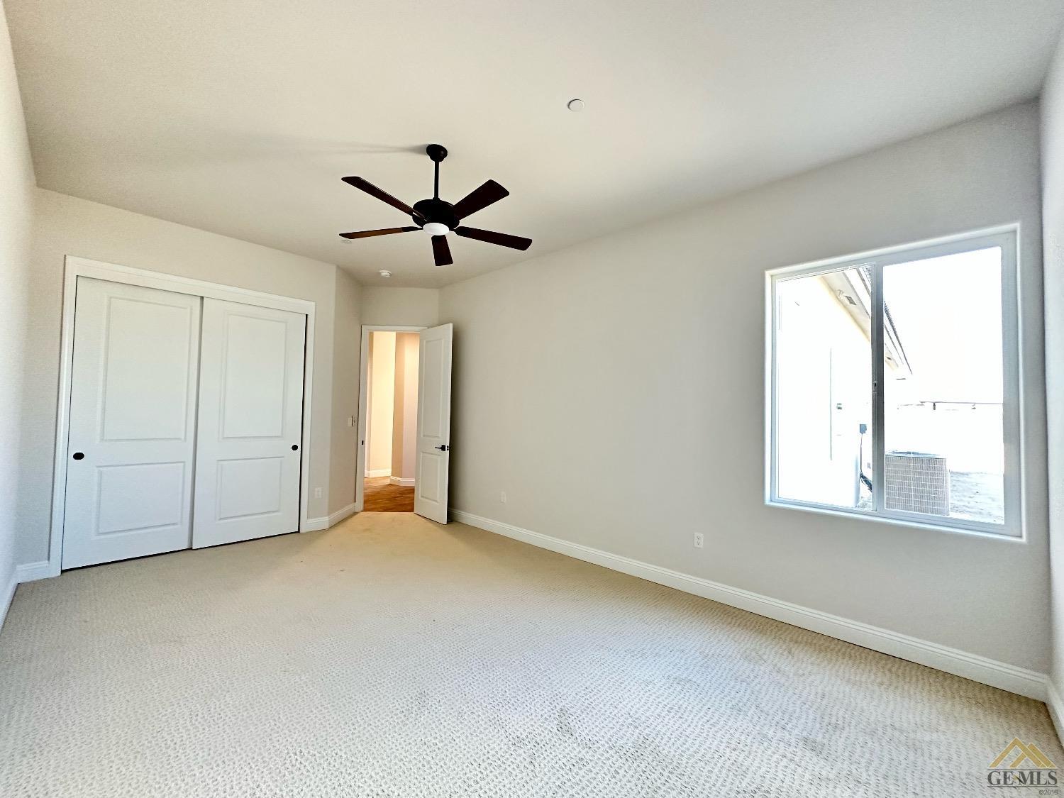 Undisclosed Address Bakersfield, CA 93314 - Photo 26 of 34 a view of an empty room with a window