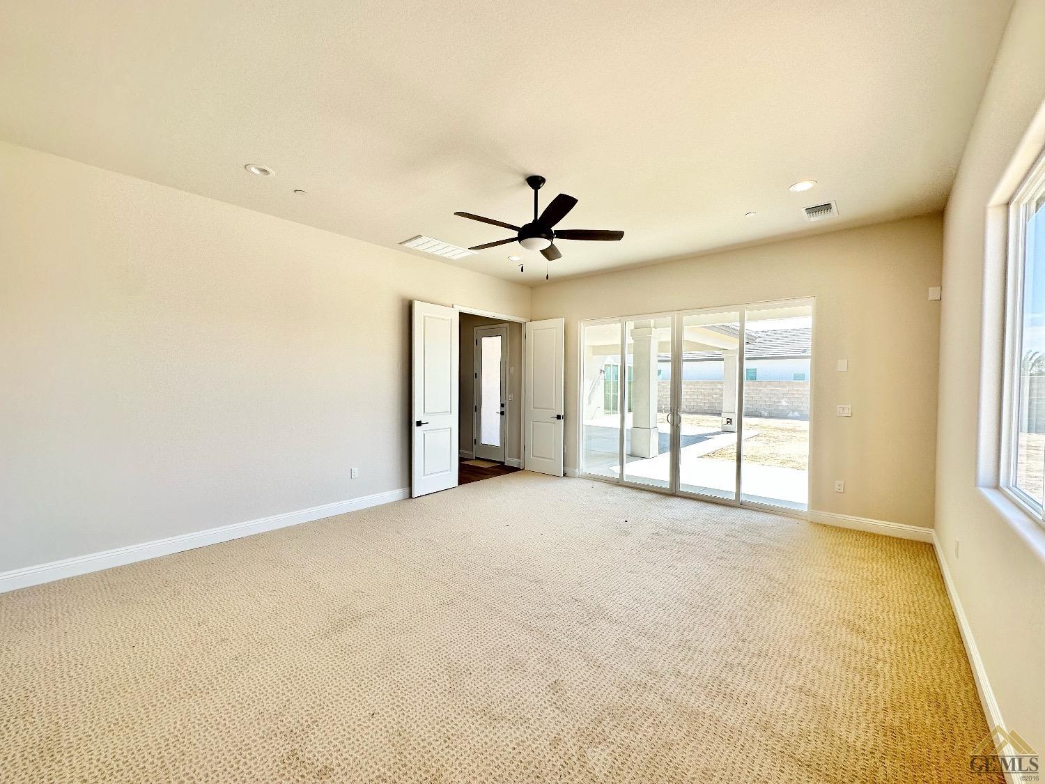 Undisclosed Address Bakersfield, CA 93314 - Photo 27 of 34 a view of an empty room with a window