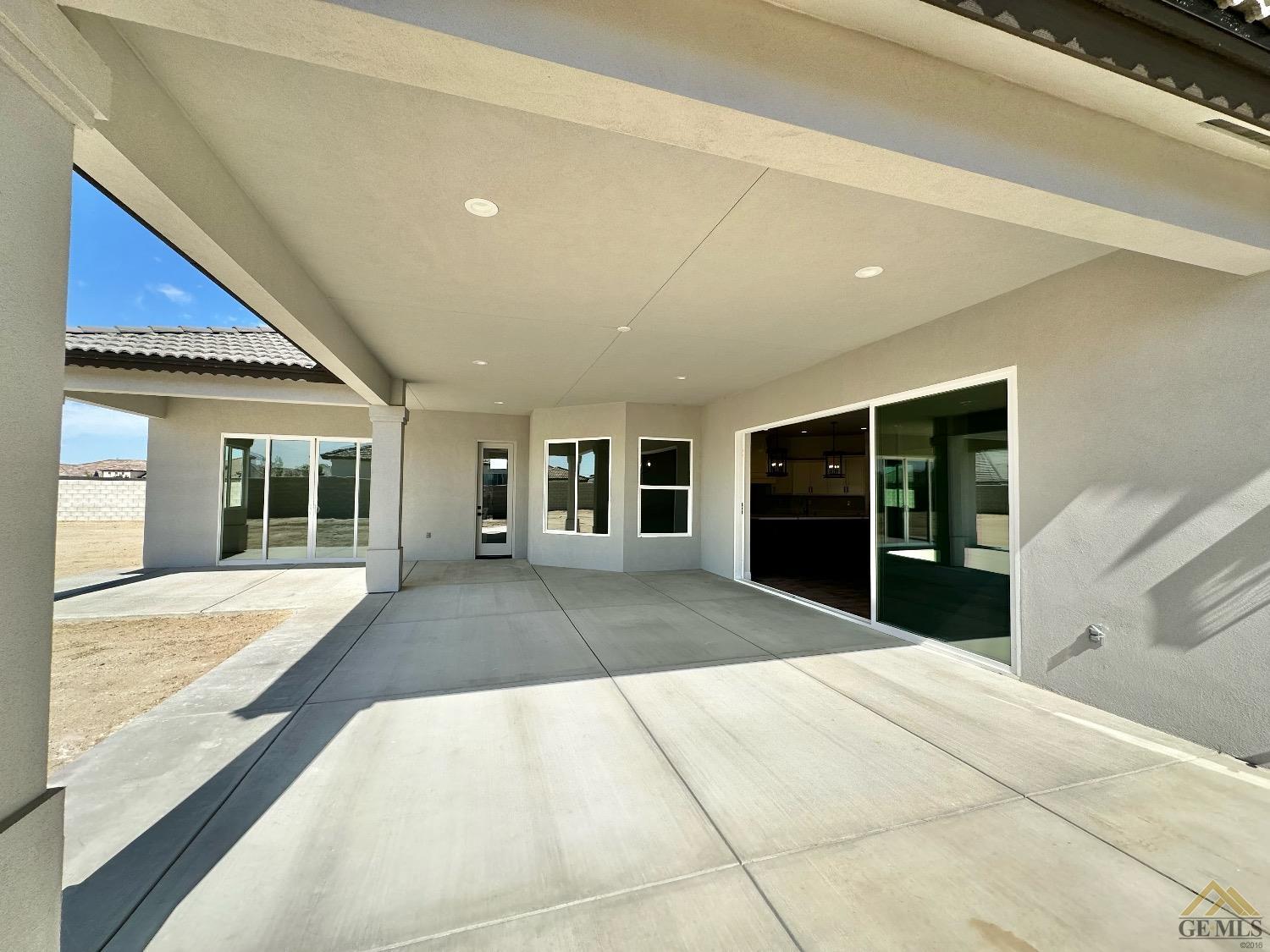 Undisclosed Address Bakersfield, CA 93314 - Photo 30 of 34 a view of a house with a large window and a large window