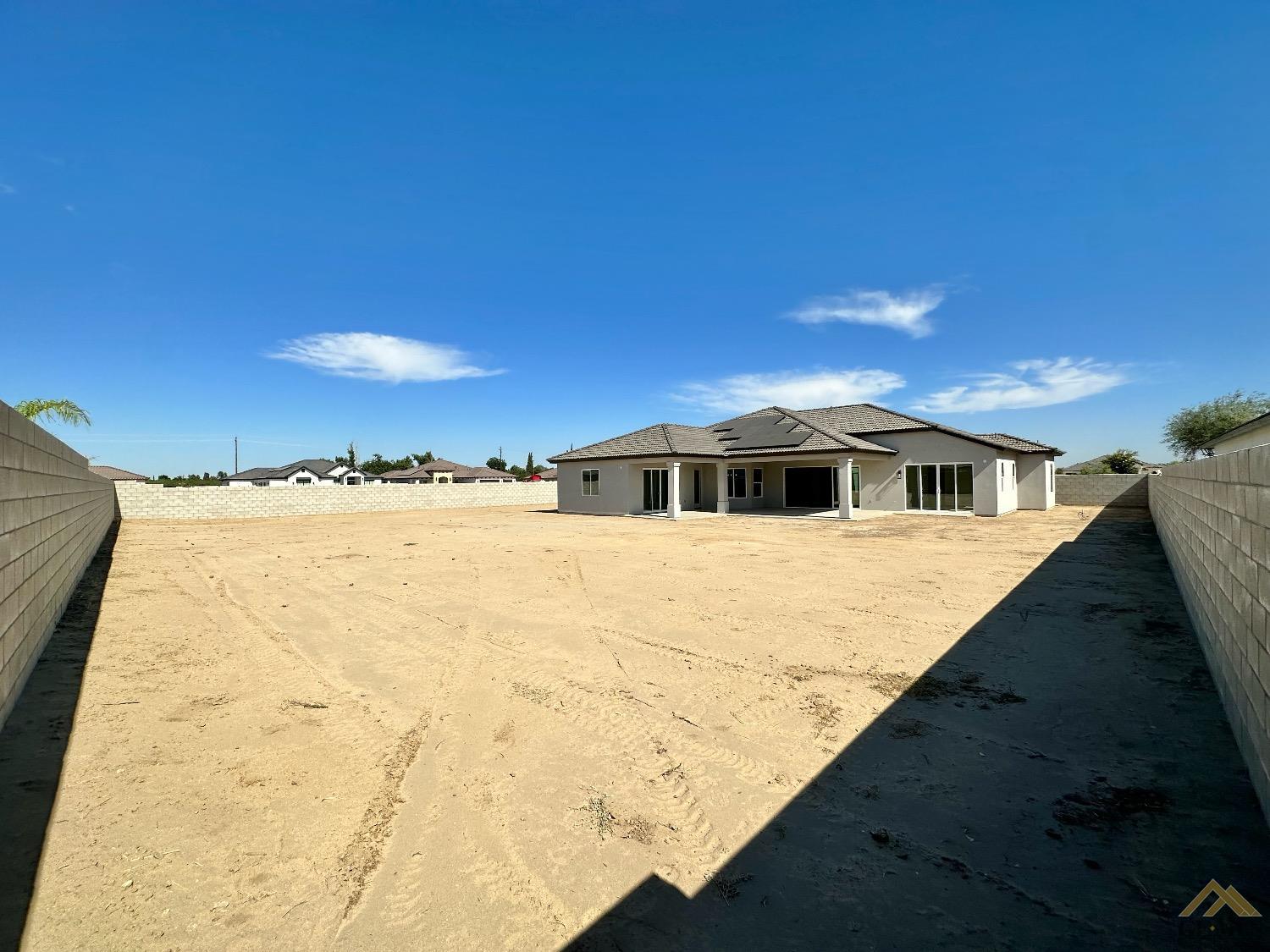 Undisclosed Address Bakersfield, CA 93314 - Photo 31 of 34 a front view of a house with a yard