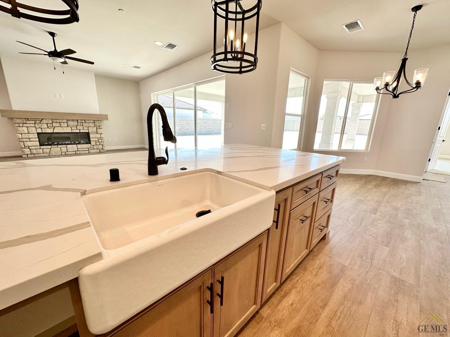 Undisclosed Address Bakersfield, CA 93314 - Photo 7 of 34 a kitchen with stainless steel appliances a sink and a stove