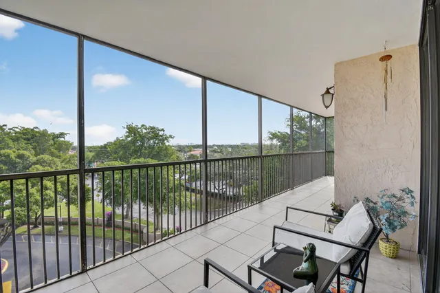 a view of a building with a street