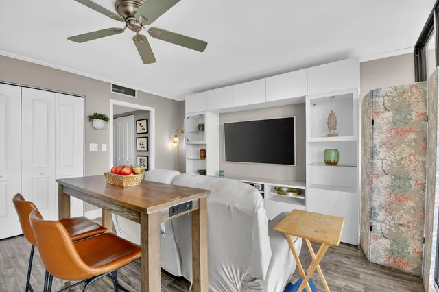 a kitchen with stainless steel appliances a refrigerator sink and cabinets