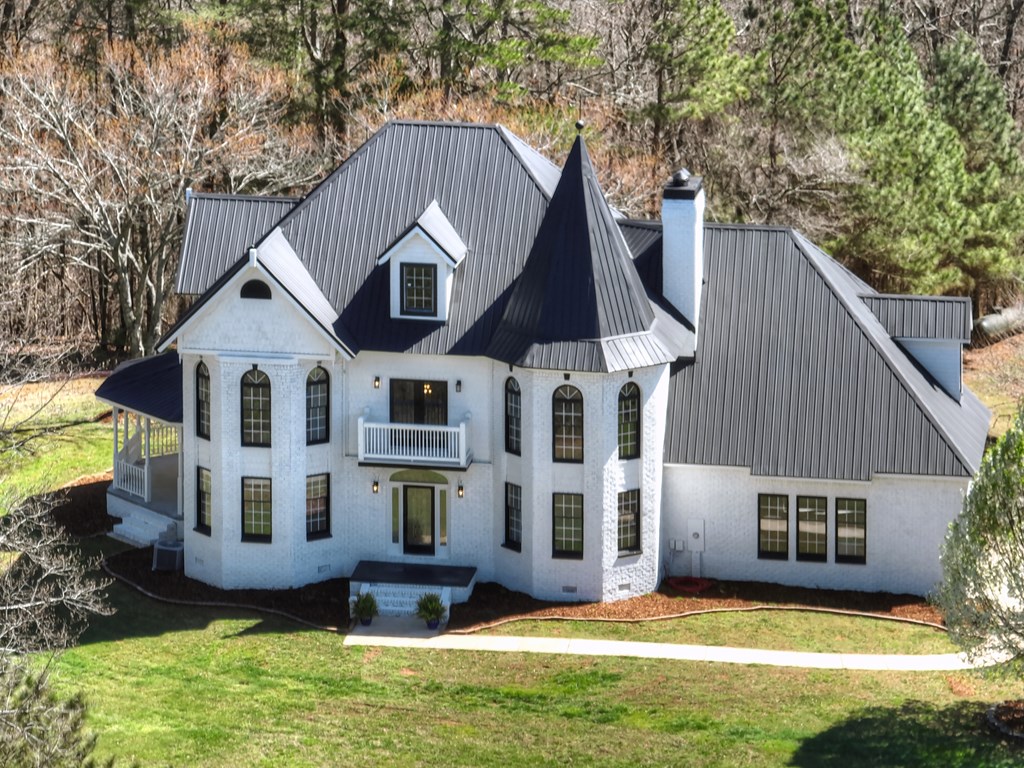 229 Crossroads Church Road Ellijay, GA 30540 - Photo 13 of 71 a front view of house with yard and trees in the background