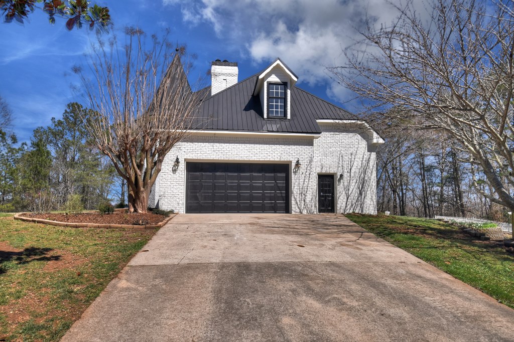 229 Crossroads Church Road Ellijay, GA 30540 - Photo 15 of 71 a front view of a house with yard and trees