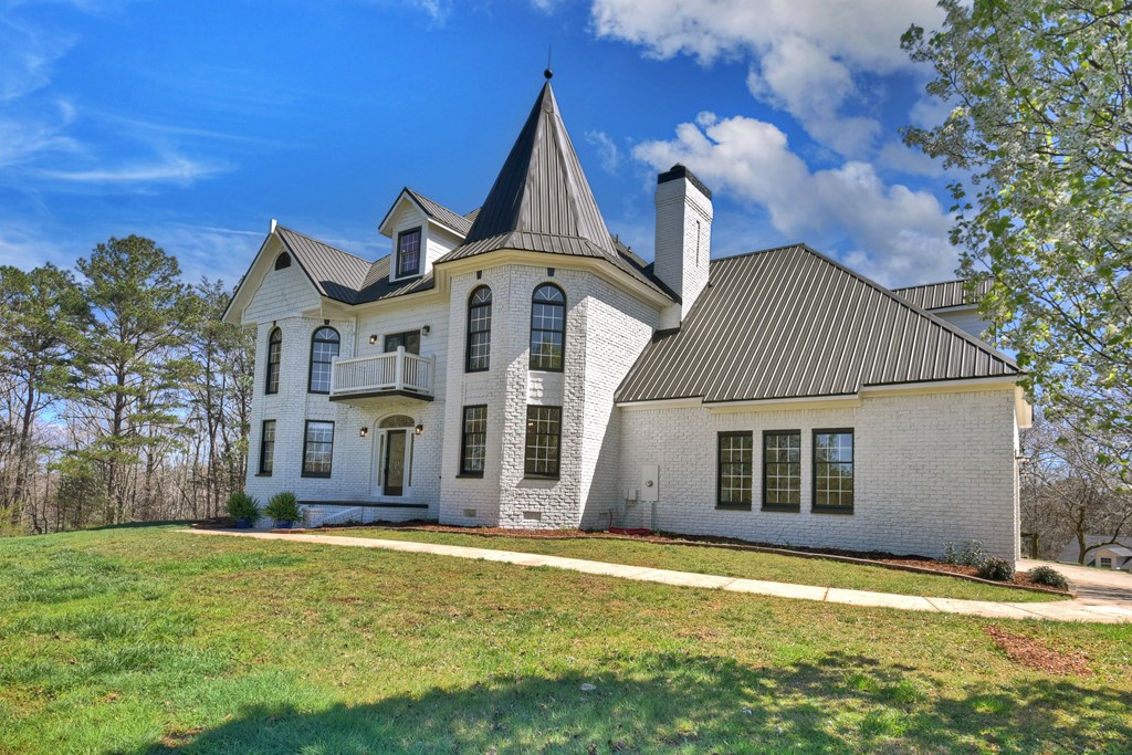 229 Crossroads Church Road Ellijay, GA 30540 - Photo 17 of 71 a front view of a house with a yard