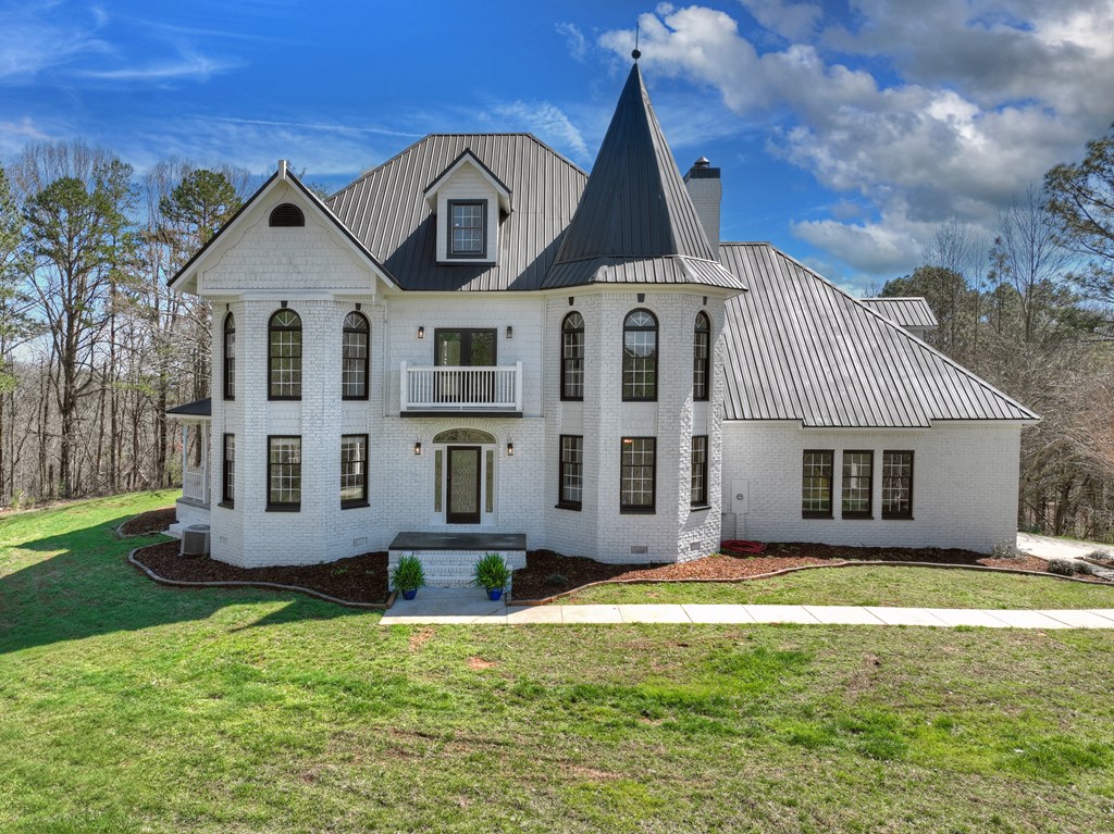 229 Crossroads Church Road Ellijay, GA 30540 - Photo 20 of 71 a front view of a house with a yard