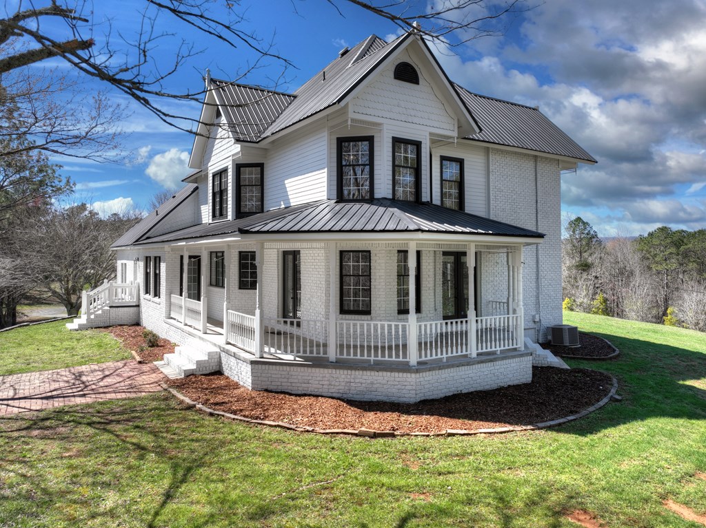 229 Crossroads Church Road Ellijay, GA 30540 - Photo 2 of 71 a front view of a house with a yard