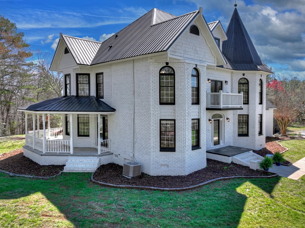 229 Crossroads Church Road Ellijay, GA 30540 - Photo 21 of 71 a front view of a house with a yard