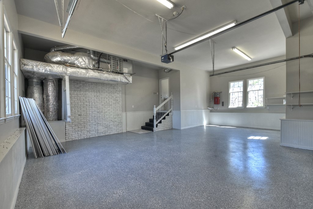 229 Crossroads Church Road Ellijay, GA 30540 - Photo 23 of 71 a view of a hallway with wooden floor and staircase