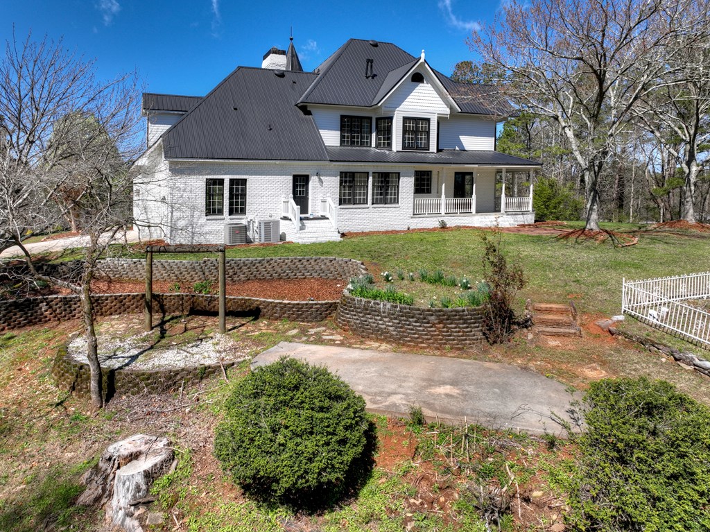 229 Crossroads Church Road Ellijay, GA 30540 - Photo 4 of 71 a front view of a house with a yard