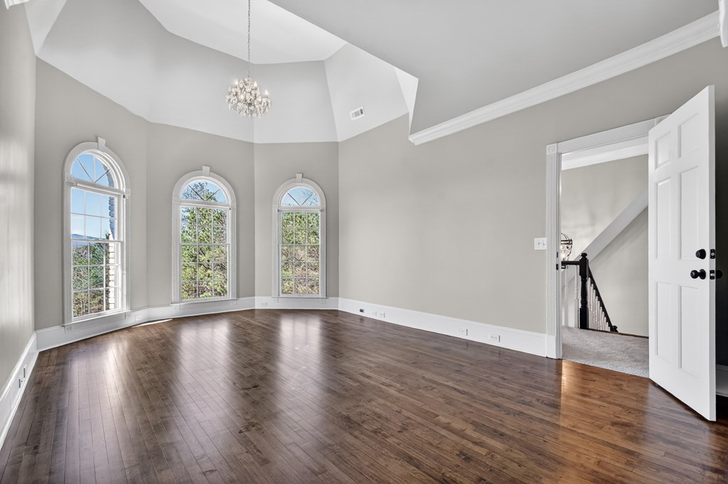 229 Crossroads Church Road Ellijay, GA 30540 - Photo 60 of 71 a view of an empty room with wooden floor and a window