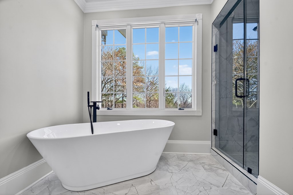 229 Crossroads Church Road Ellijay, GA 30540 - Photo 63 of 71 a white bath tub sitting in a bathroom