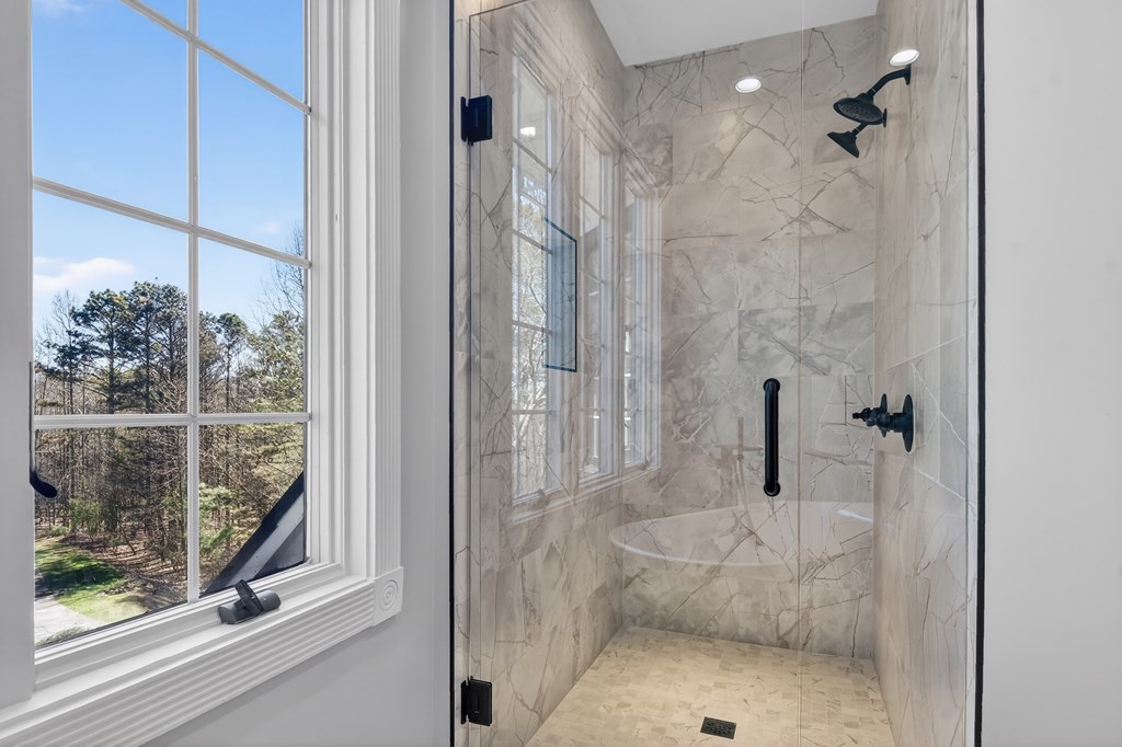 229 Crossroads Church Road Ellijay, GA 30540 - Photo 65 of 71 a bathroom with a shower