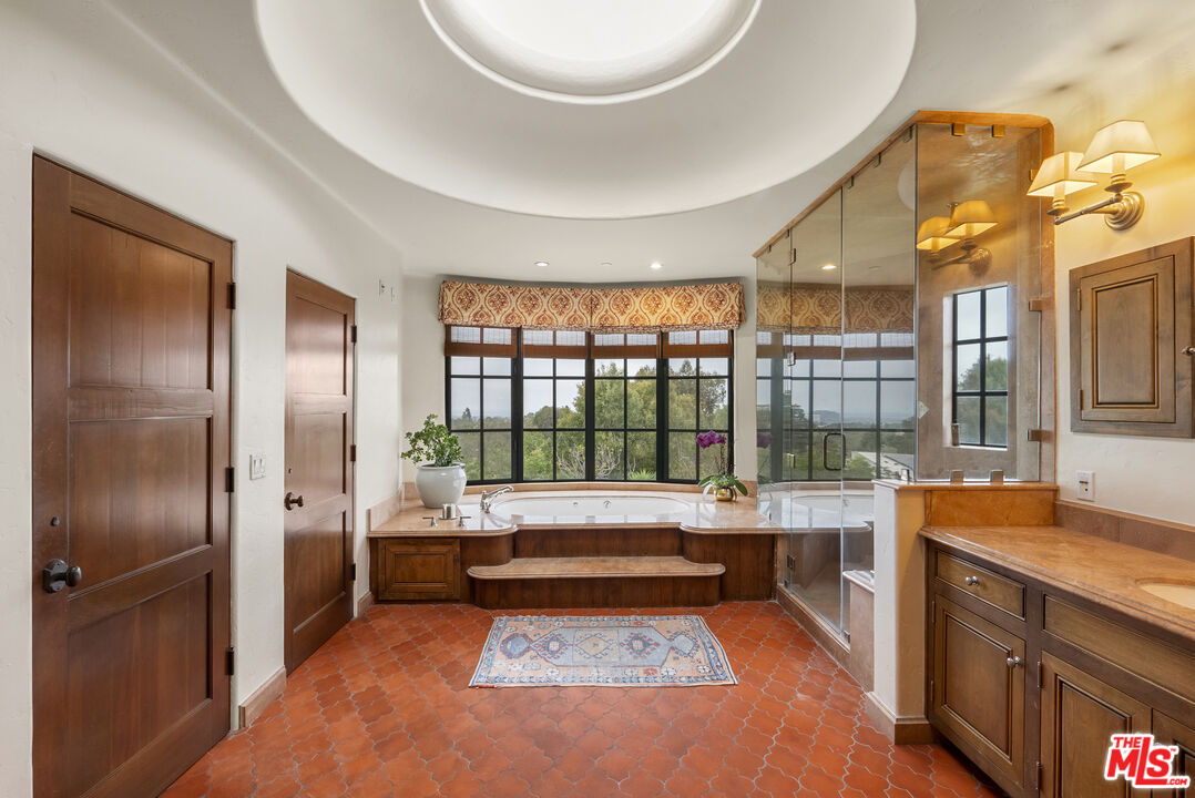361 Fordyce Road Los Angeles, CA 90049 - Photo 19 of 40 a room with pool table and windows