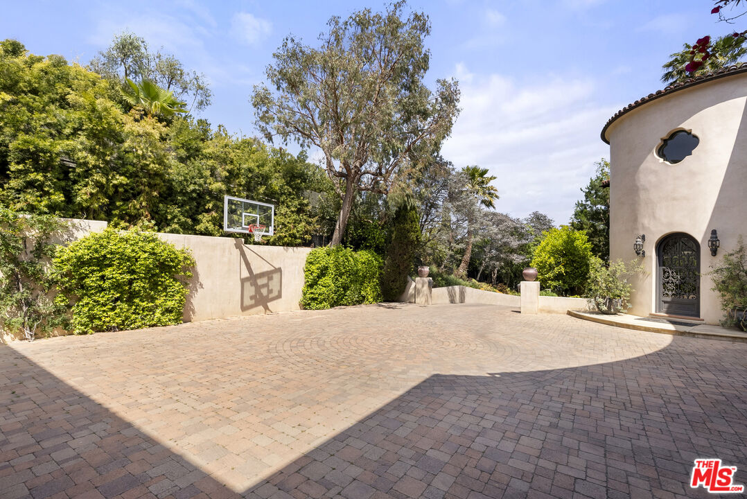 361 Fordyce Road Los Angeles, CA 90049 - Photo 3 of 40 swimming pool view with a outdoor space